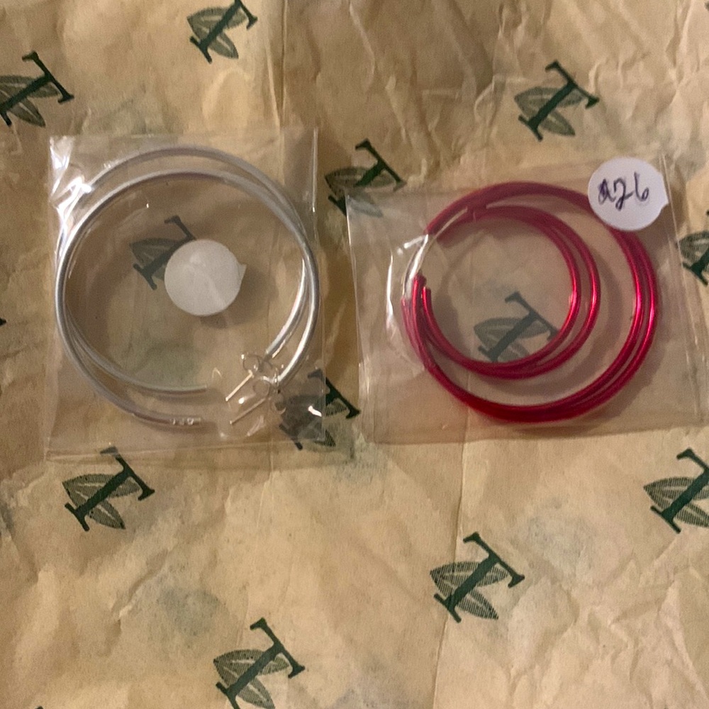 New hoop earrings -1 classic silver pair & 1 sexy red double hoops